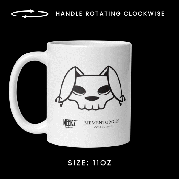 Rotating view of the 11oz mug from the Memento Mori collection, featuring Bu the Bully graphics.