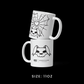 Stacked view of the 11oz mug from the Memento Mori collection, featuring Bu the Bully graphics.