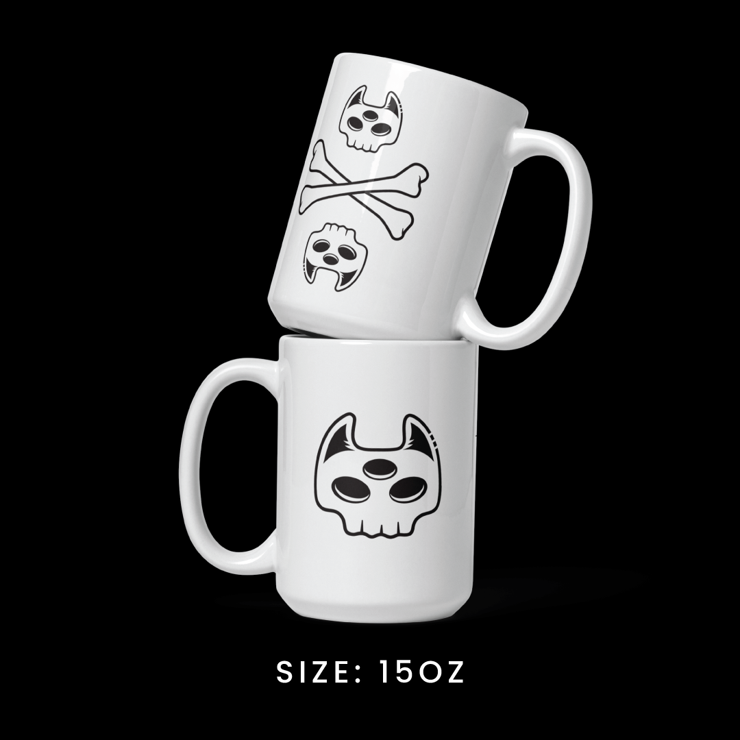 Stacked view of the 15oz mug from the Memento Mori collection, featuring Manxx the Magician graphics.