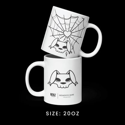 Stacked view of the 20oz mug from the Memento Mori collection, featuring Bu the Bully graphics.