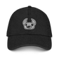 Front view of Gregore denim hat featuring Gregore's head embroidered directly centered.