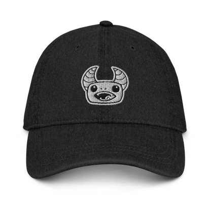 Front view of Gregore denim hat featuring Gregore's head embroidered directly centered.