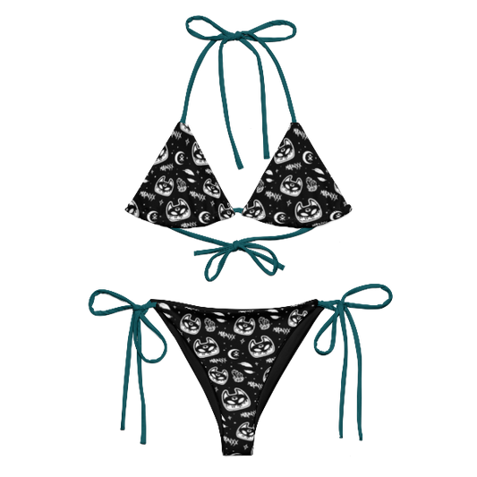 Two-piece string bikini featuring a Manxx the Magician pattern with Deep Atlantic Blue strings.