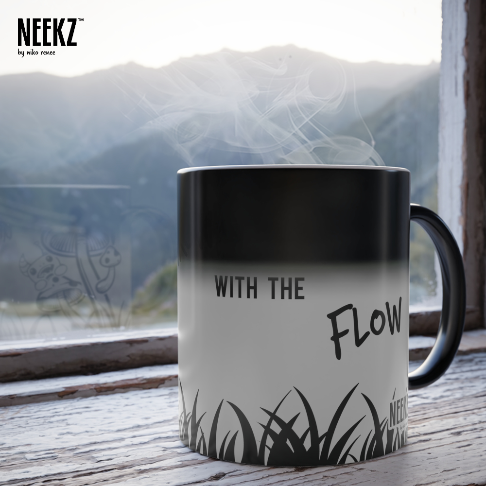 Heat reactive "Grow with the Flow" mug, mid-transition from black (cold) to white (hot).