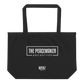 Jumbo black tote bag with white "The Peacemaker Archetype" text imprinted on the back.